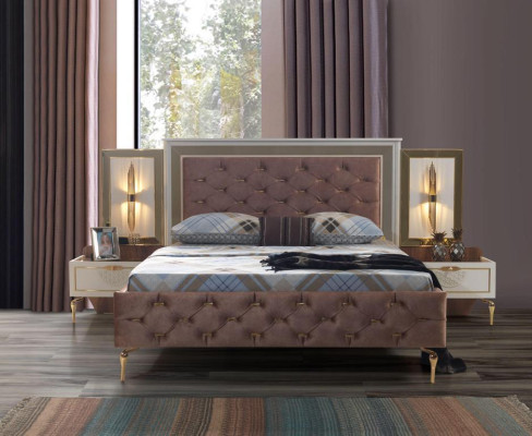 Elegant Chesterfield comfort bed with gold legs and matching bedside tables