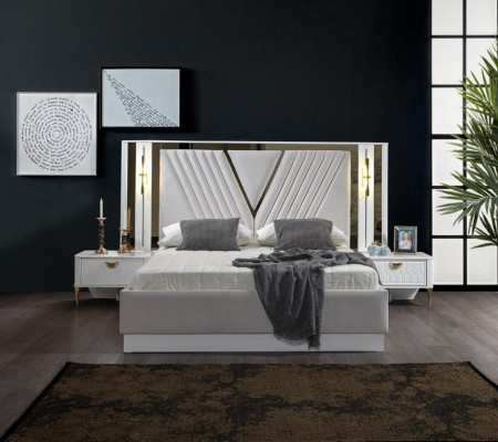 2-bedroom bed with gold trim and matching bedside tables