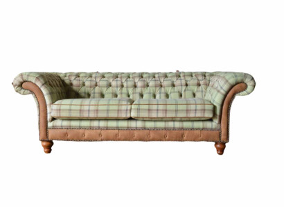 Luxurious designer sofa in Chesterfield design with three seats