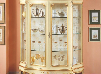 Glass showcase with artistic carvings and elegant design