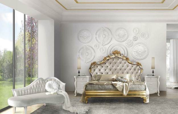 Beautiful bed in classic style with carved headboard