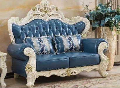 Classic s Chesterfield two-seater leather sofa with hand-carved details