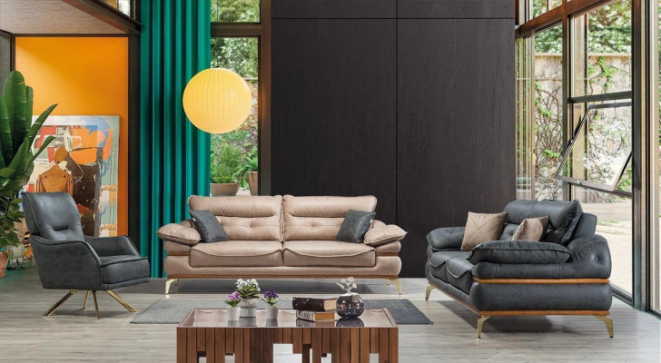 Modern designer gray living room with 3-seater sofa and new armchair