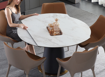 A stylish round dining table for your dining room in a modern style