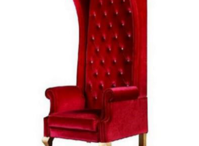 The Voltaire Chair is a stunning example of classic n English style in a rich red tone.