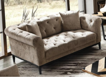Cozy beige Chesterfield three seater living room couch